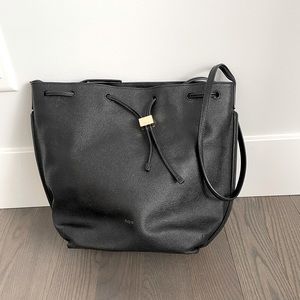 Auxiliary AUX Black leather bag